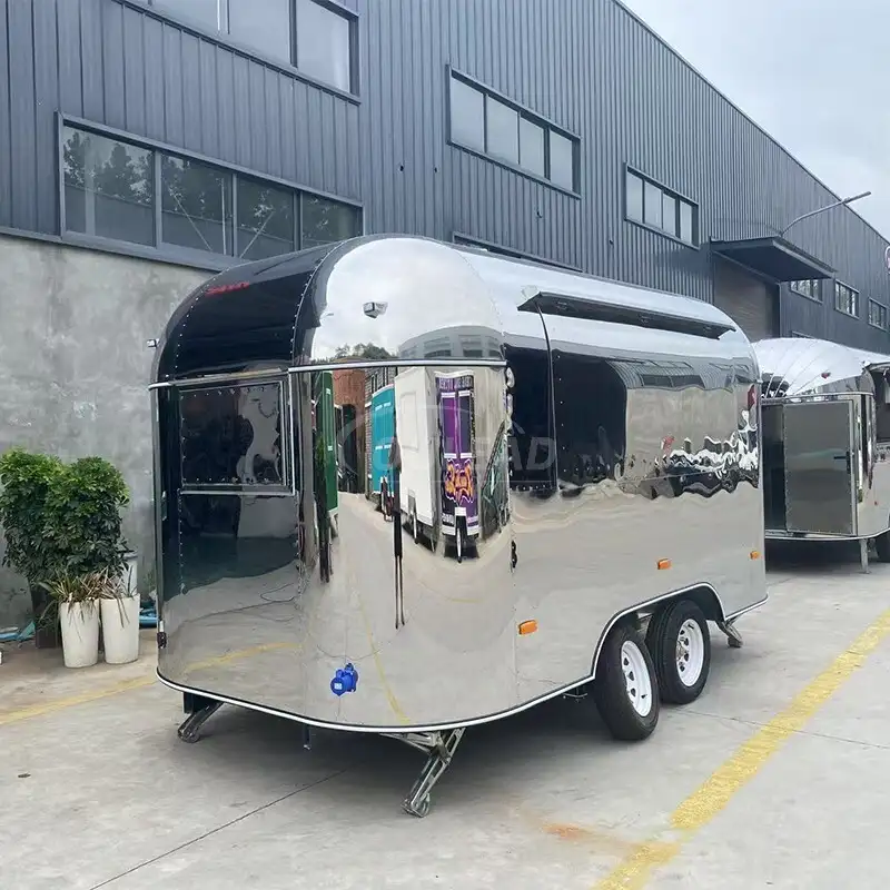 jpg65-t3-scale100 (2) Custom Mirror - Finished Stainless Steel Food Trailer - Image 1